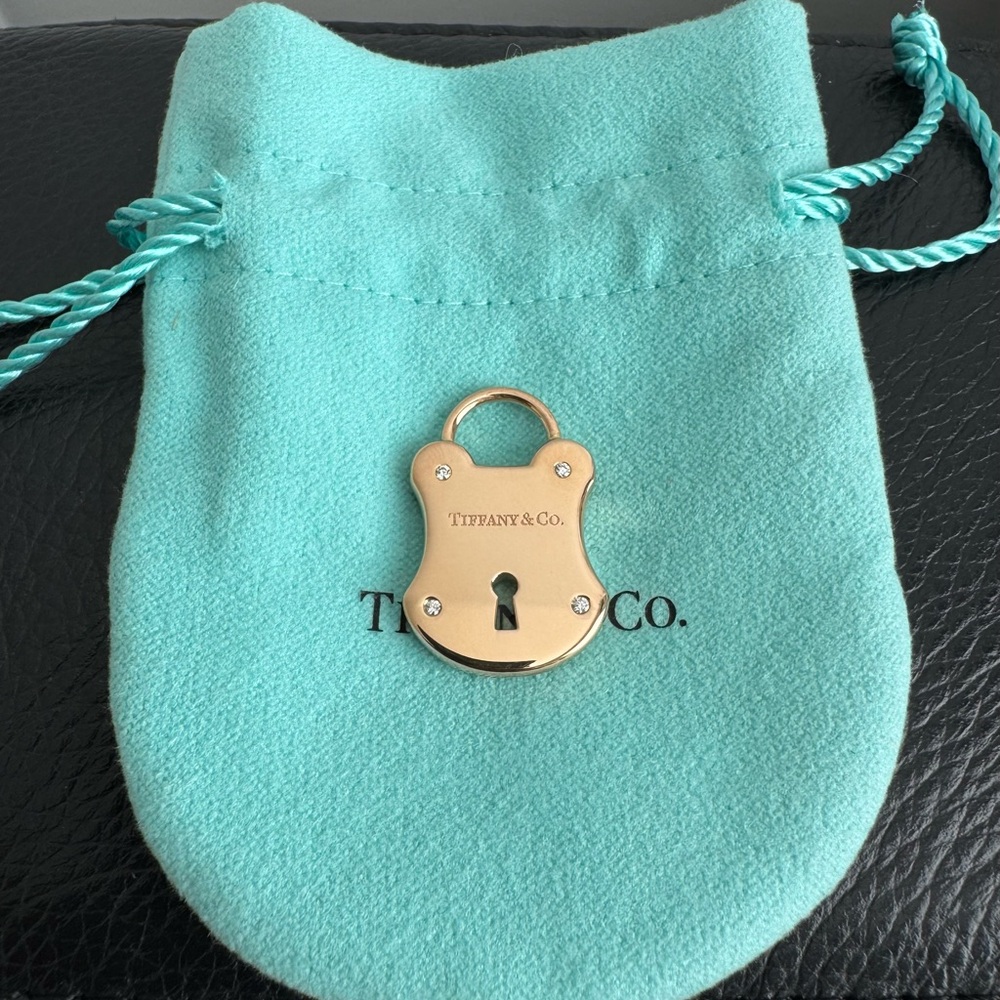 Tiffany & co 18k rose gold diamond Emblem lock pendant